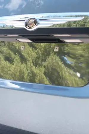 DODGE GRAND CARAVAN 4dr QAA Stainless 1pcs License Plate Bezel LP48895 Exclusive